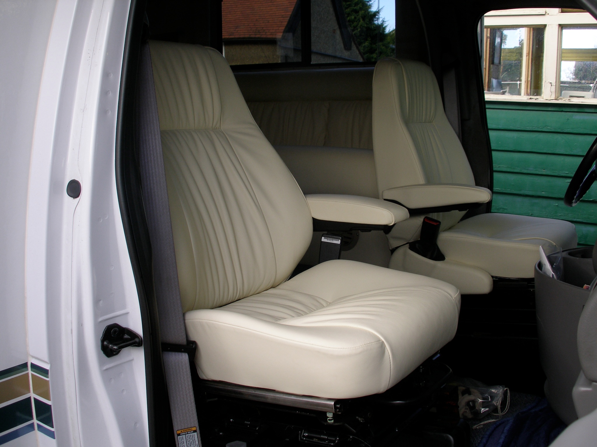 American RV luxury cream leather retrim — bespoke auto interior conversion