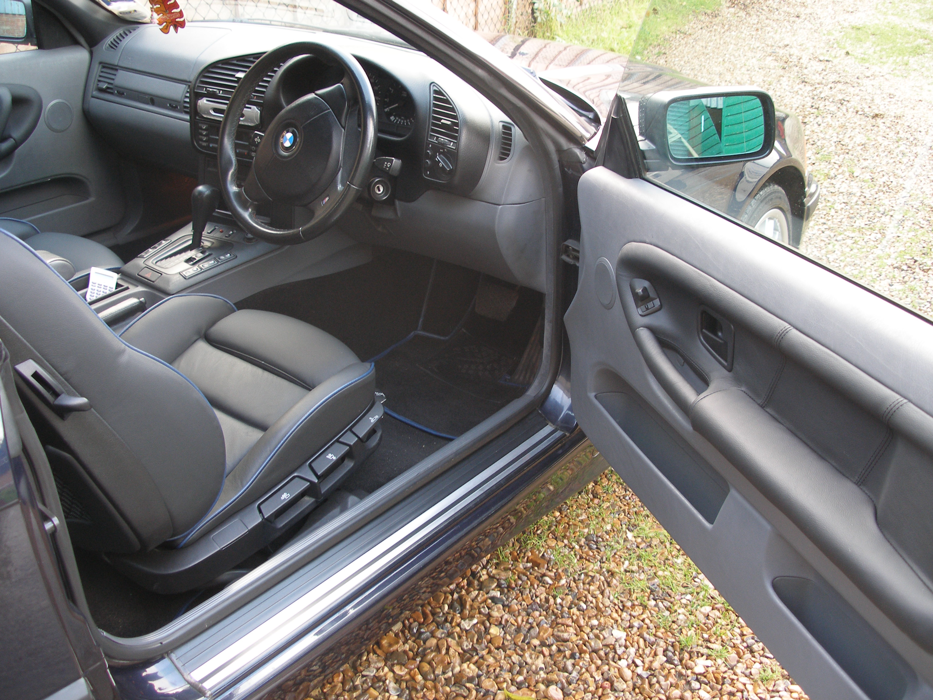 BMW E36 Cabriolet full interior retrim — charcoal leather with blue contrast stitching