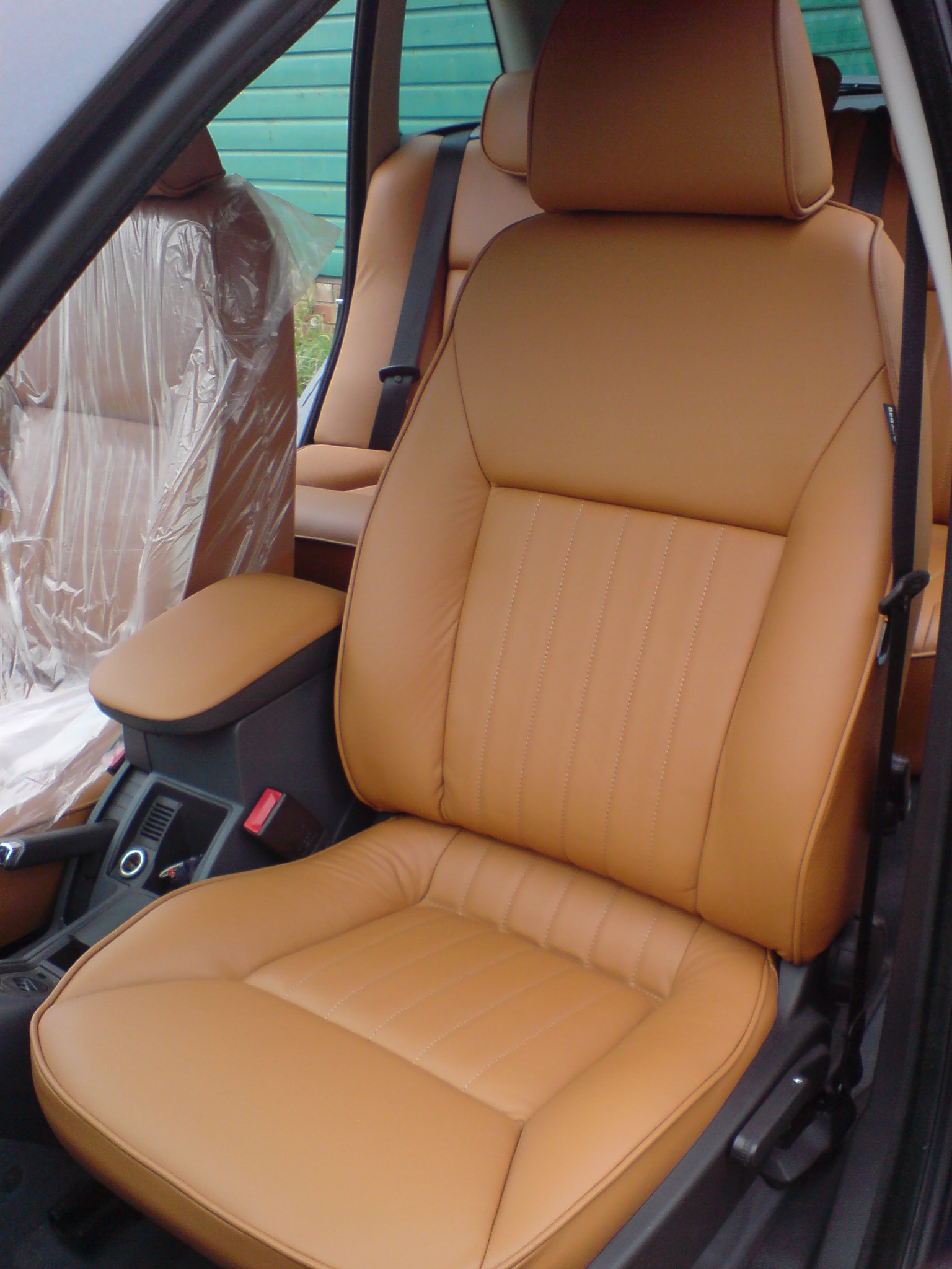 Bespoke seat reupholstery in tan leather — Auto Interiors of London
