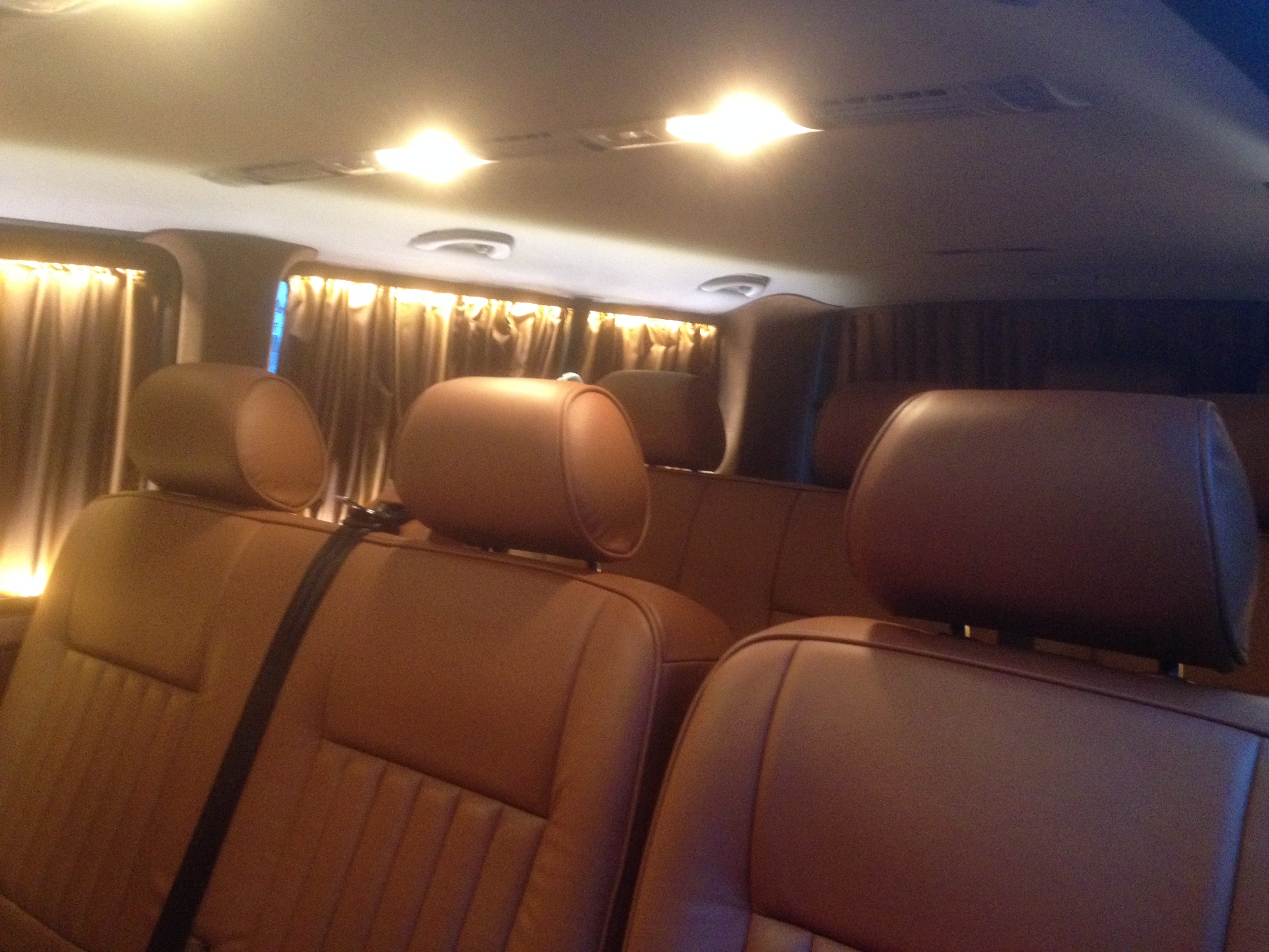 Custom headliner and roof lining with mood lighting — bespoke auto interiors